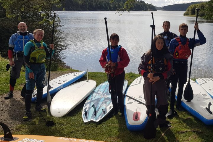 a group of people posing for the camera