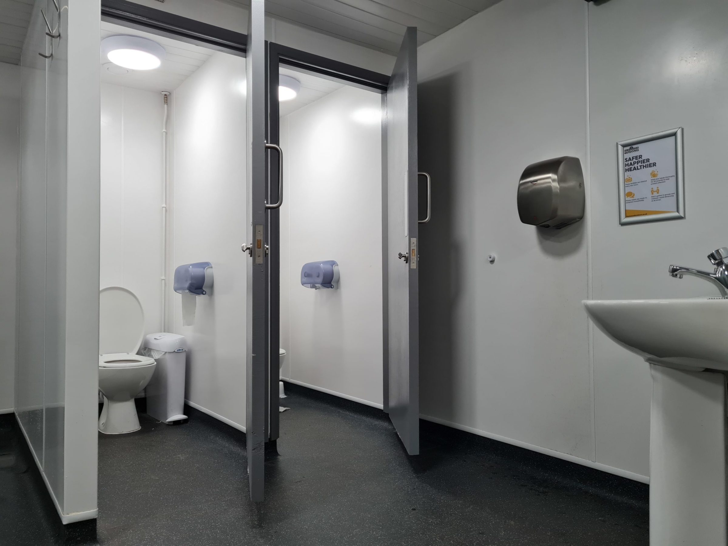 a restroom with a large mirror