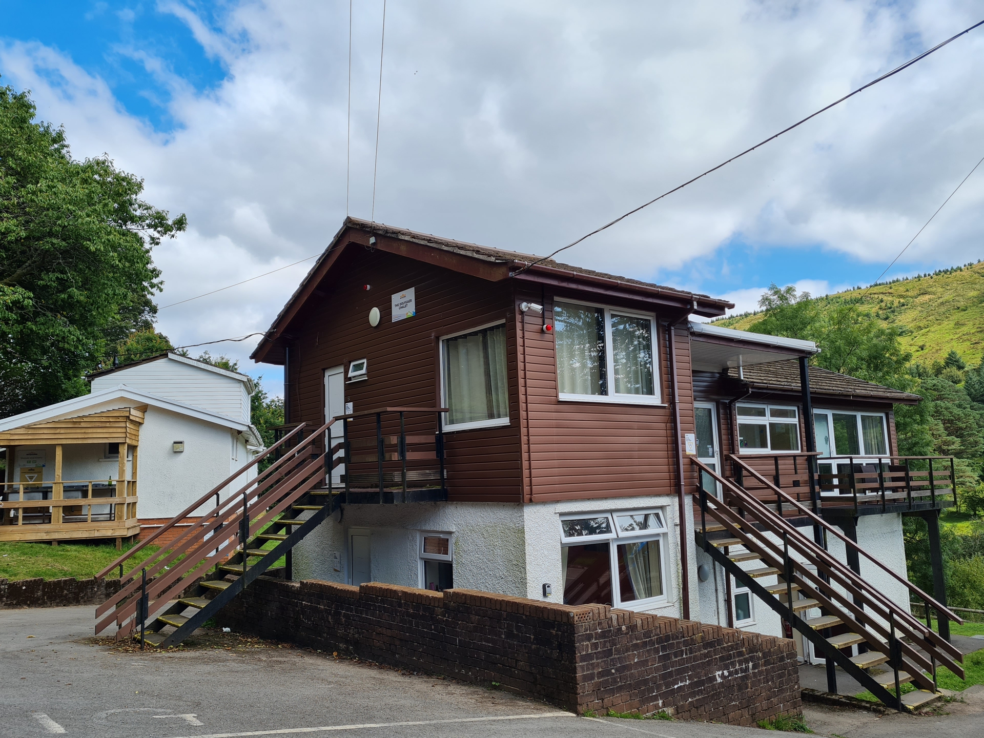 a person standing in front of a house
