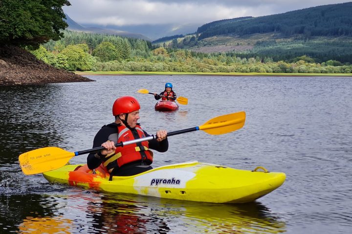 a small boat in a body of water