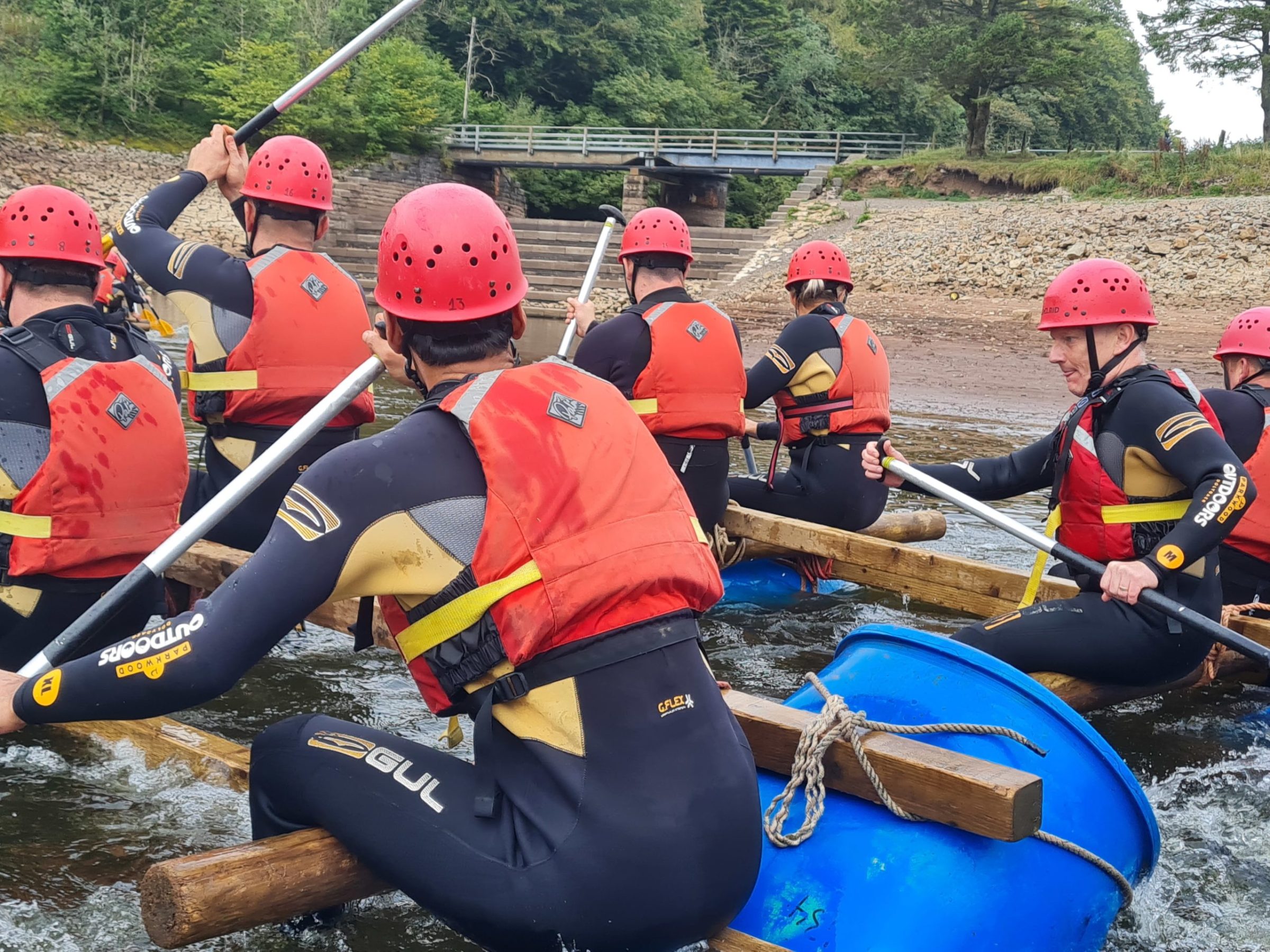 a group of people on a raft