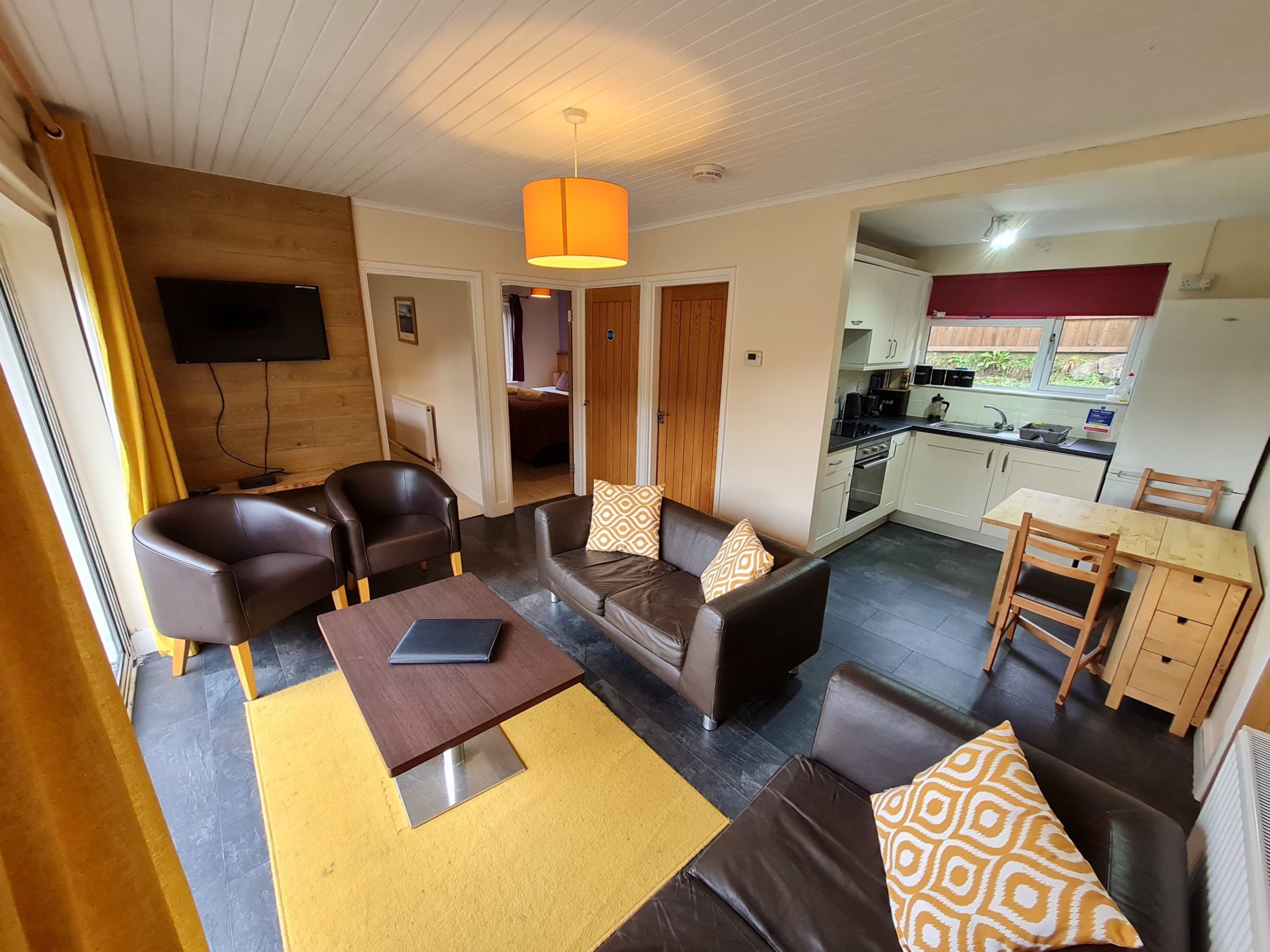 a room filled with furniture and a table