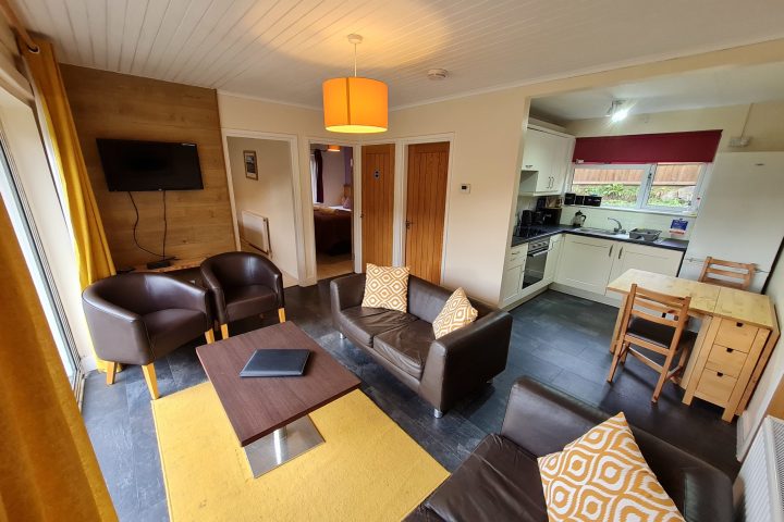 a room filled with furniture and a table