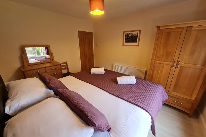 a large bed sitting in a room