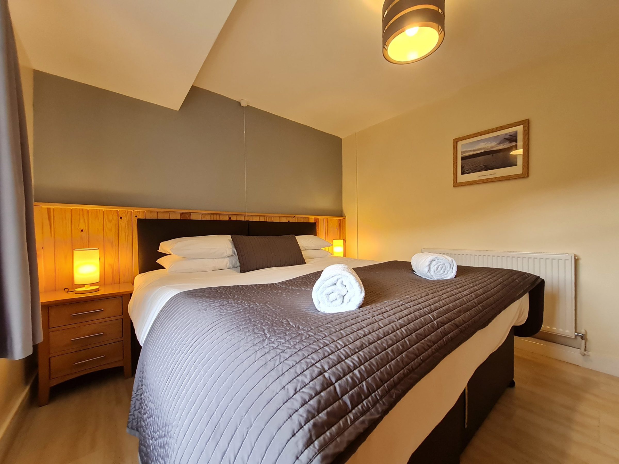 a bedroom with a bed in a hotel room