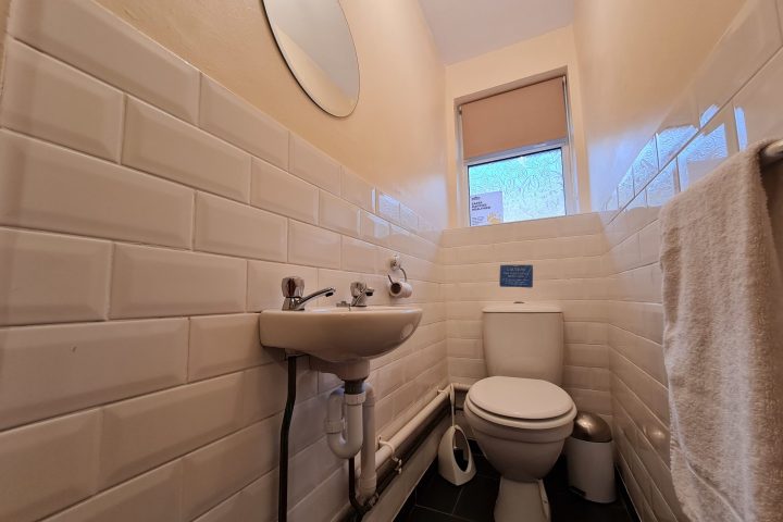 a close up of a sink in a small room