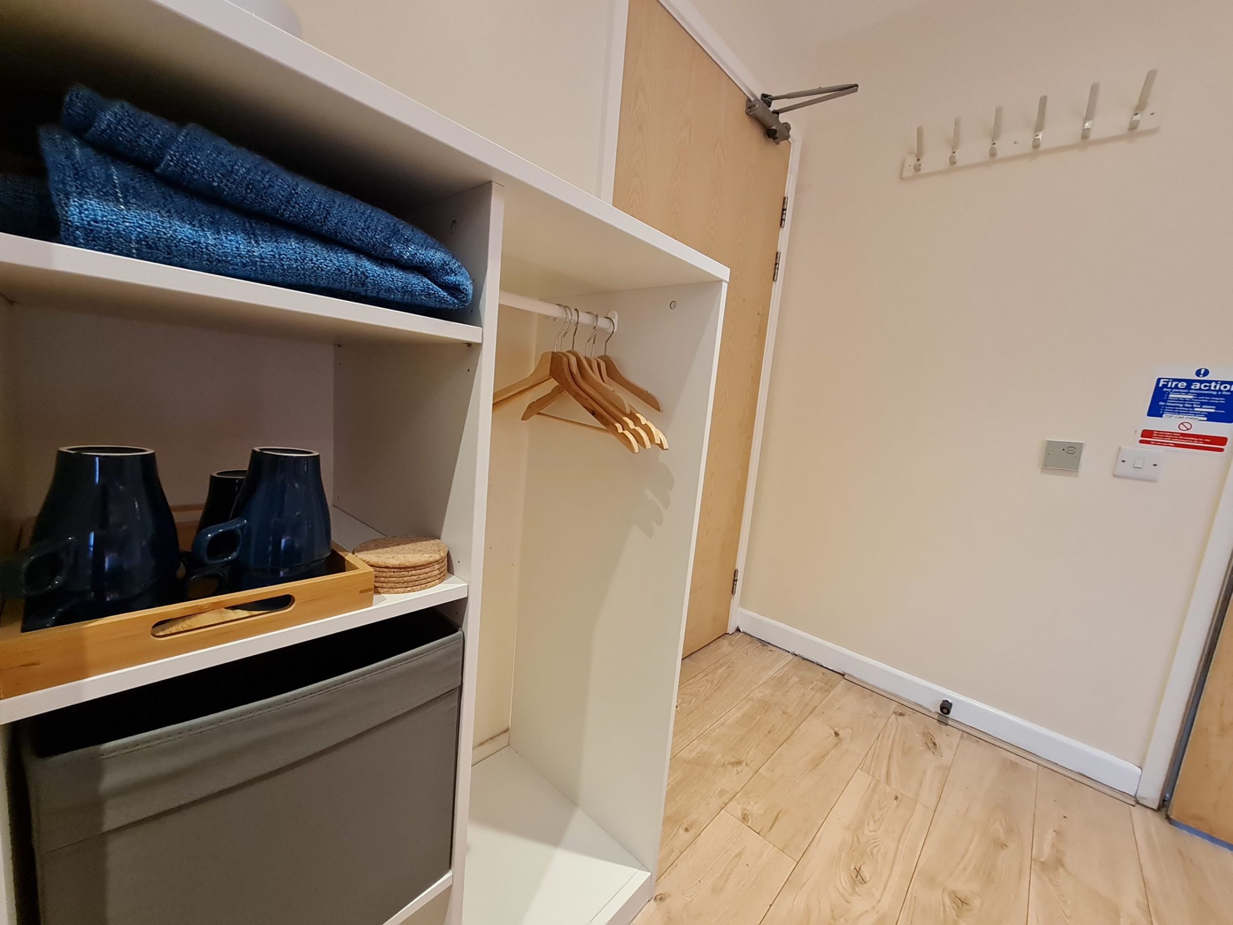 a kitchen with a sink and a mirror