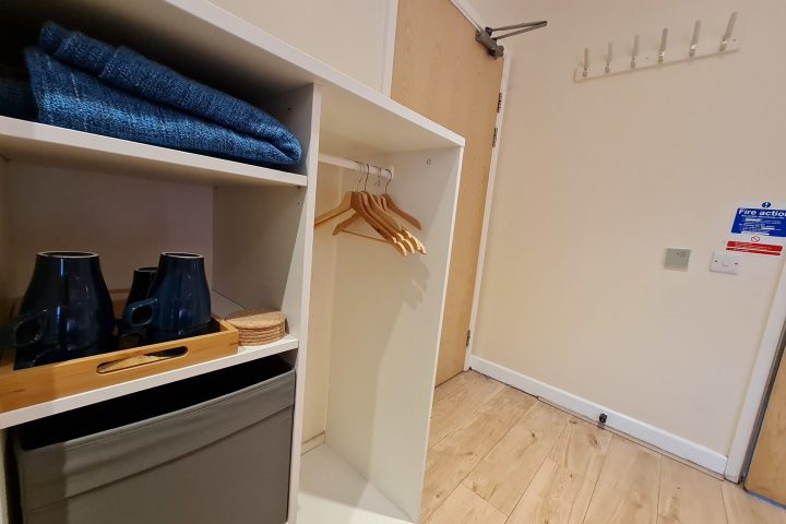 a kitchen with a sink and a mirror