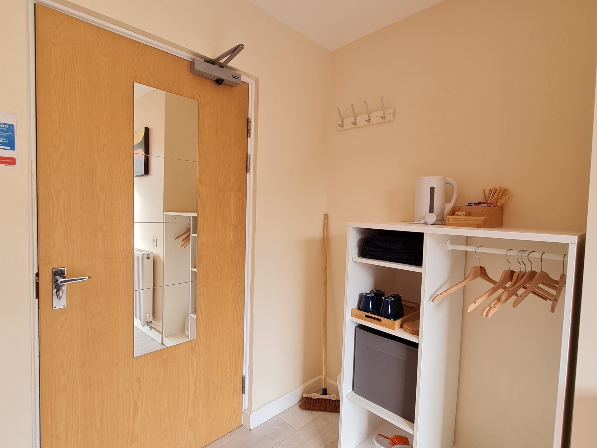 a room with a sink and a mirror