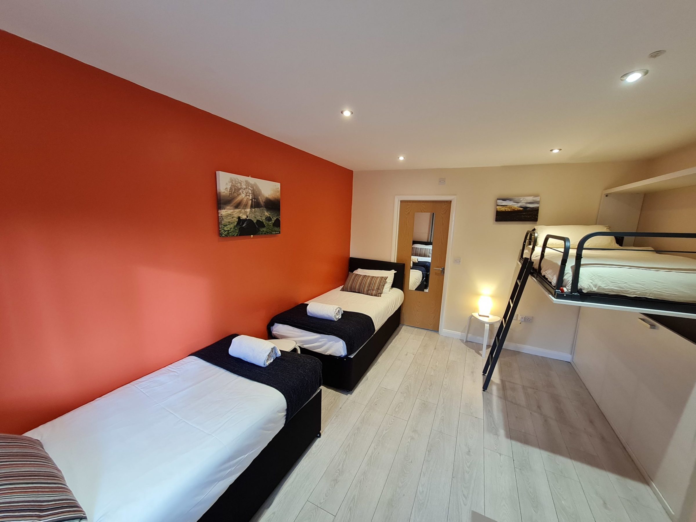 a bedroom with a bed in a room