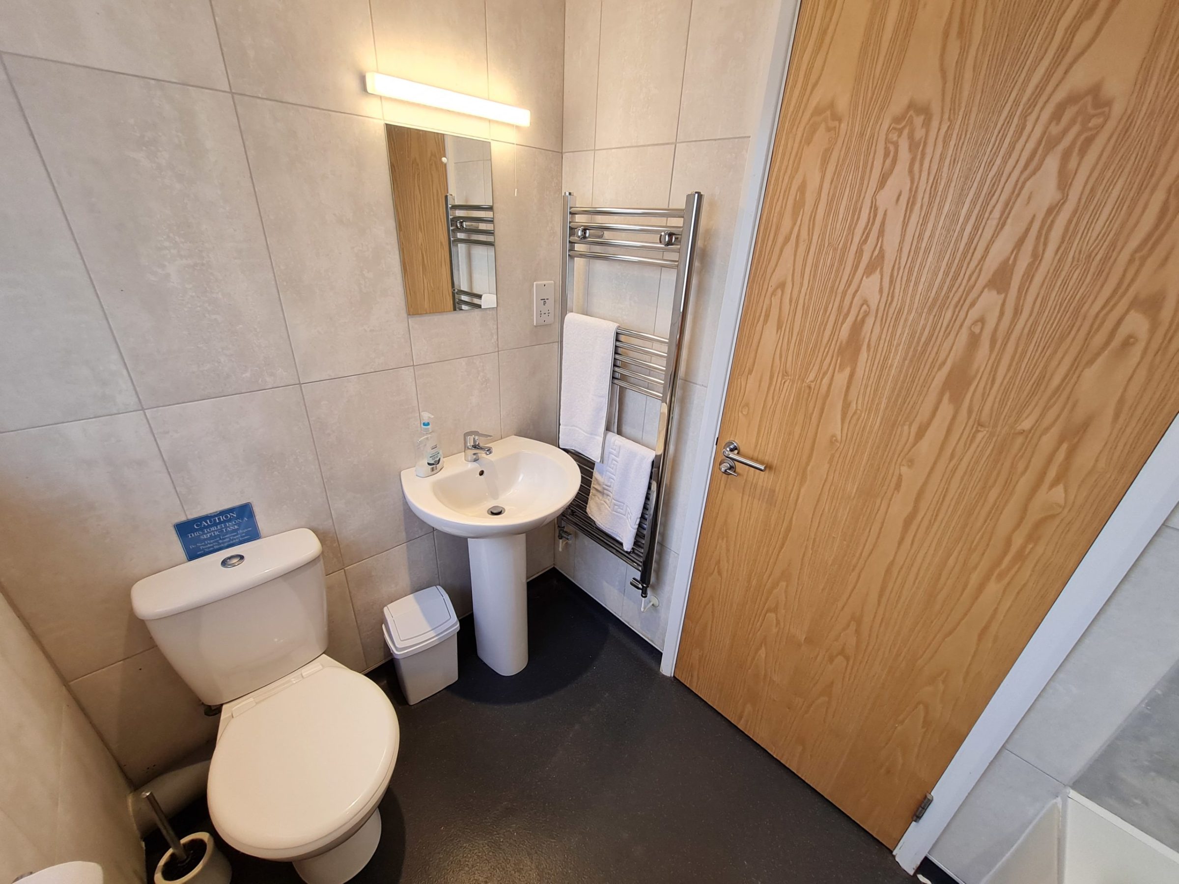 a close up of a sink in a small room