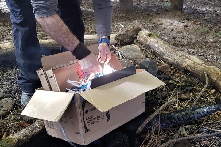 a person sitting in a box