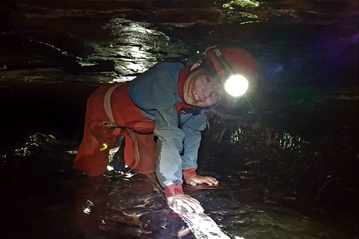 a person riding a snow board in the water