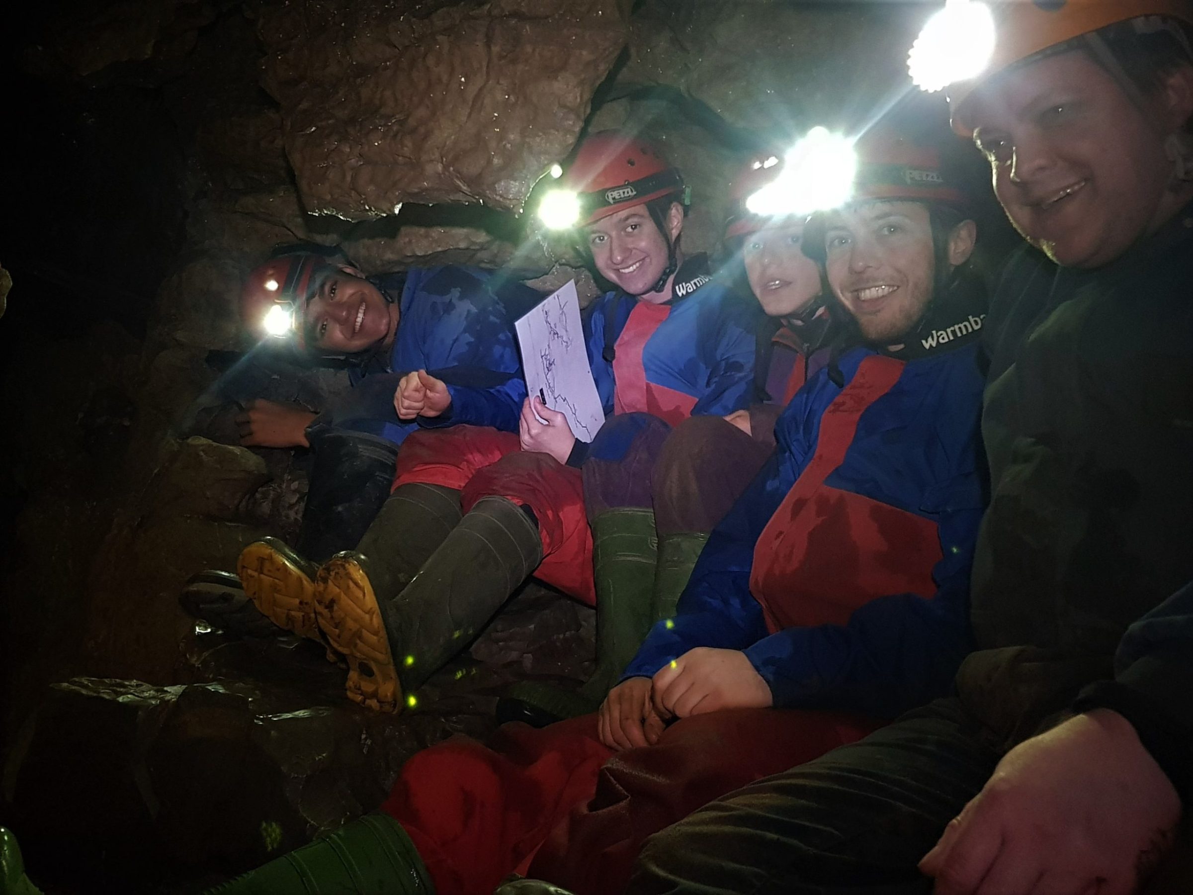 Roman Miroshnichenko et al. sitting at night