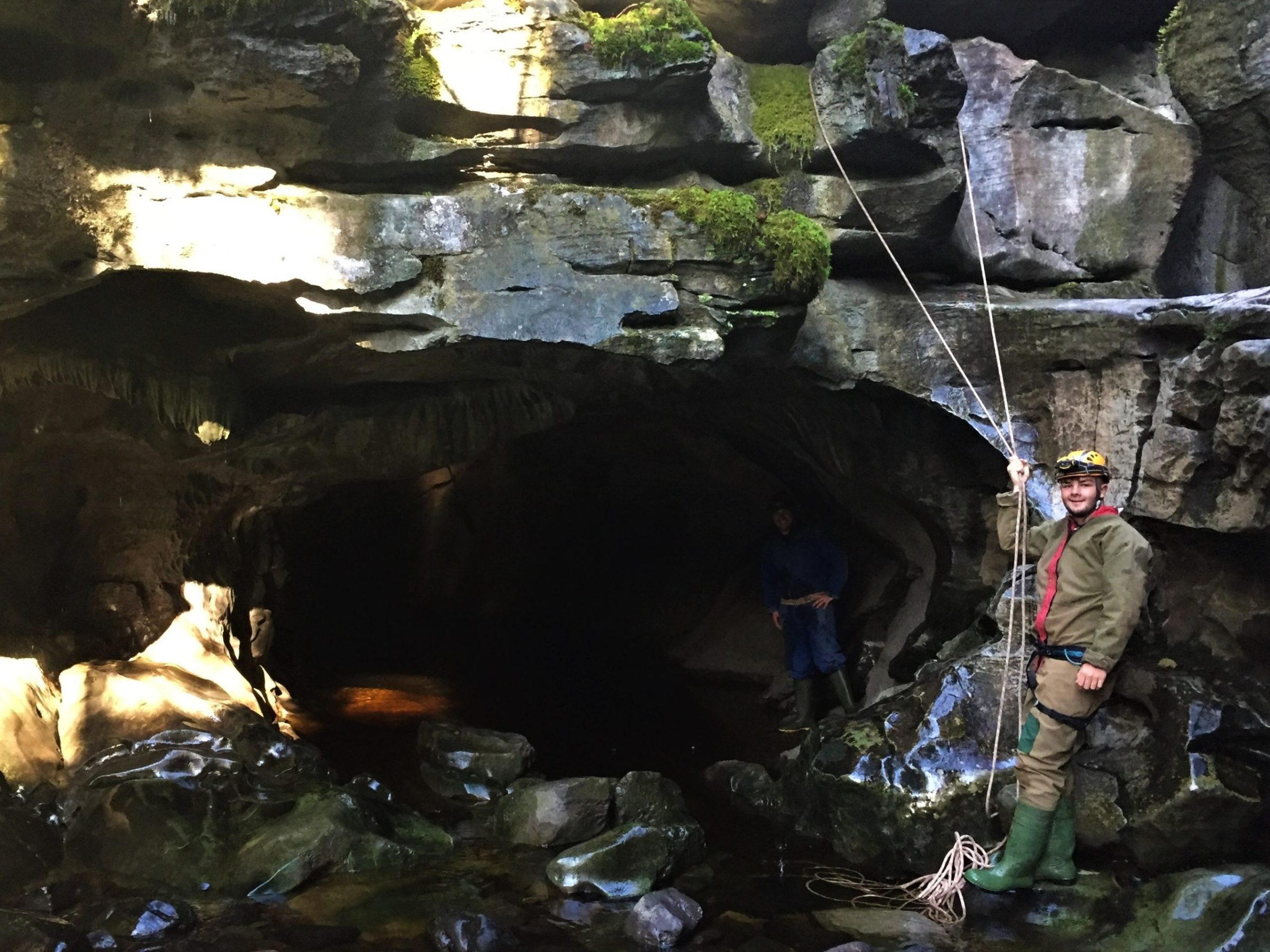 a group of people on a rock