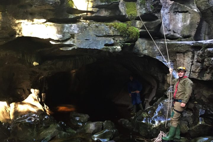 a group of people on a rock