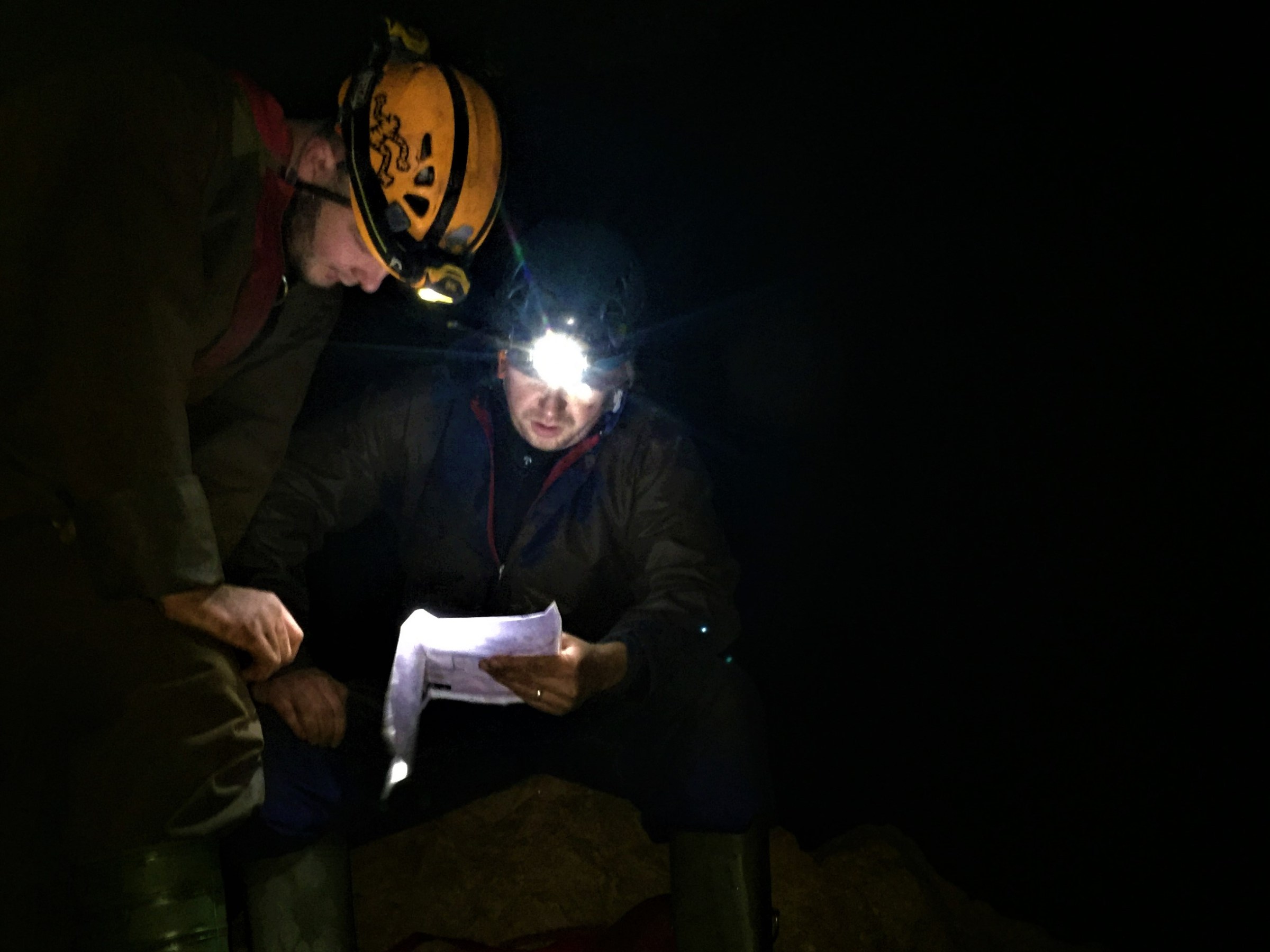 a man standing in a dark room
