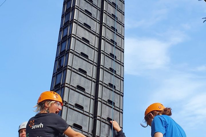 a group of people jumping in the air