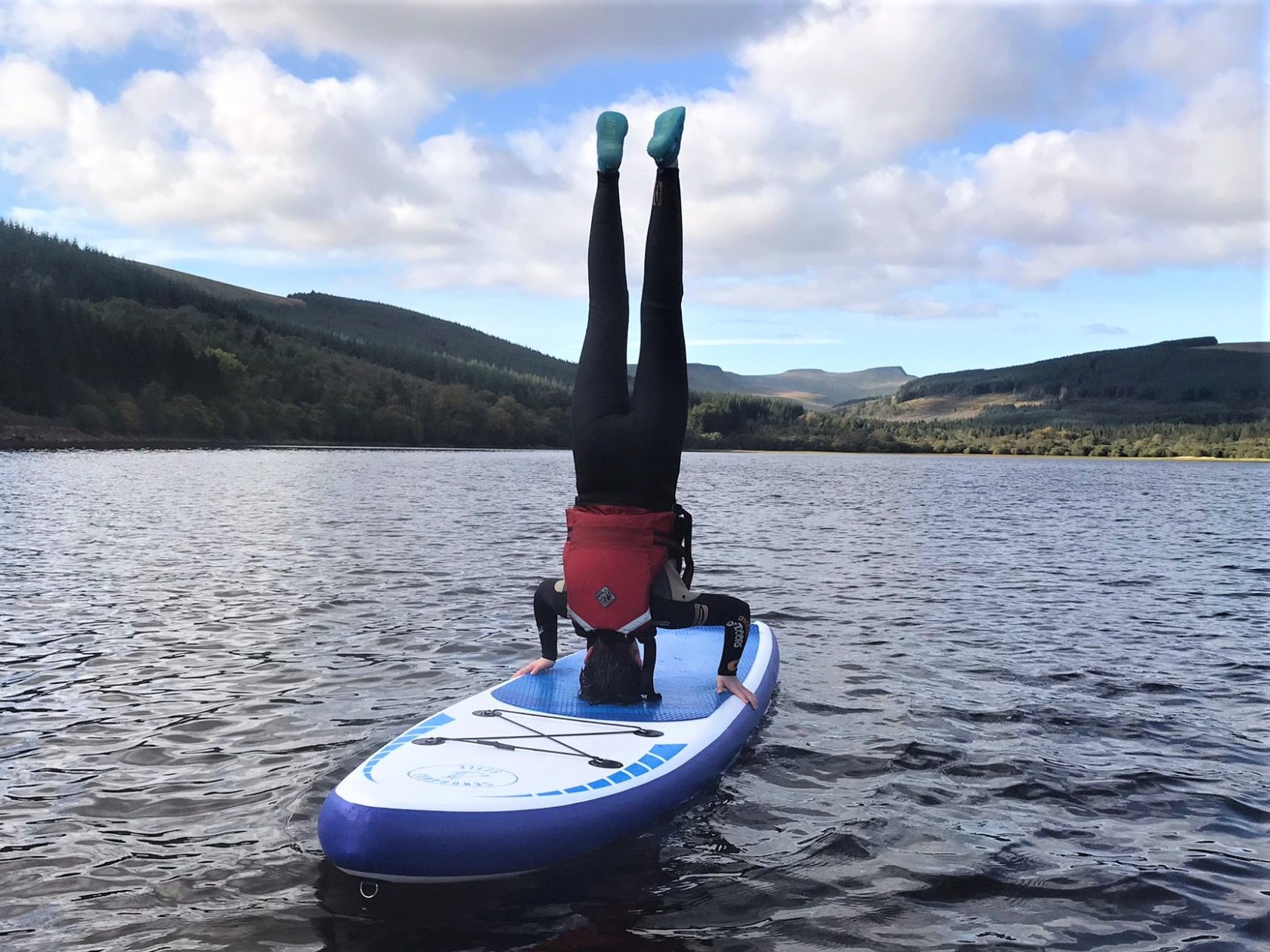 a man in a boat on a body of water