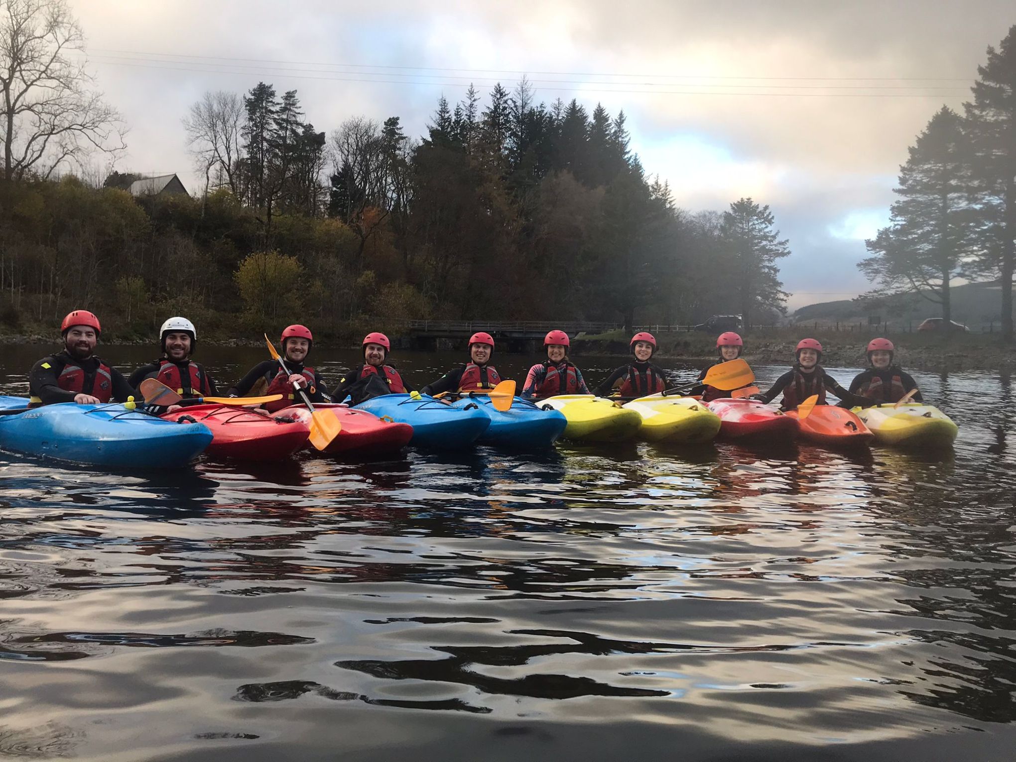 a group of people riding on the back of a boat