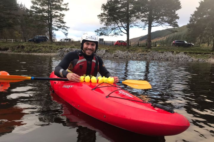 a small boat in a body of water