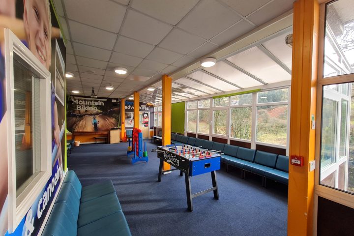 a group of people sitting at a train station