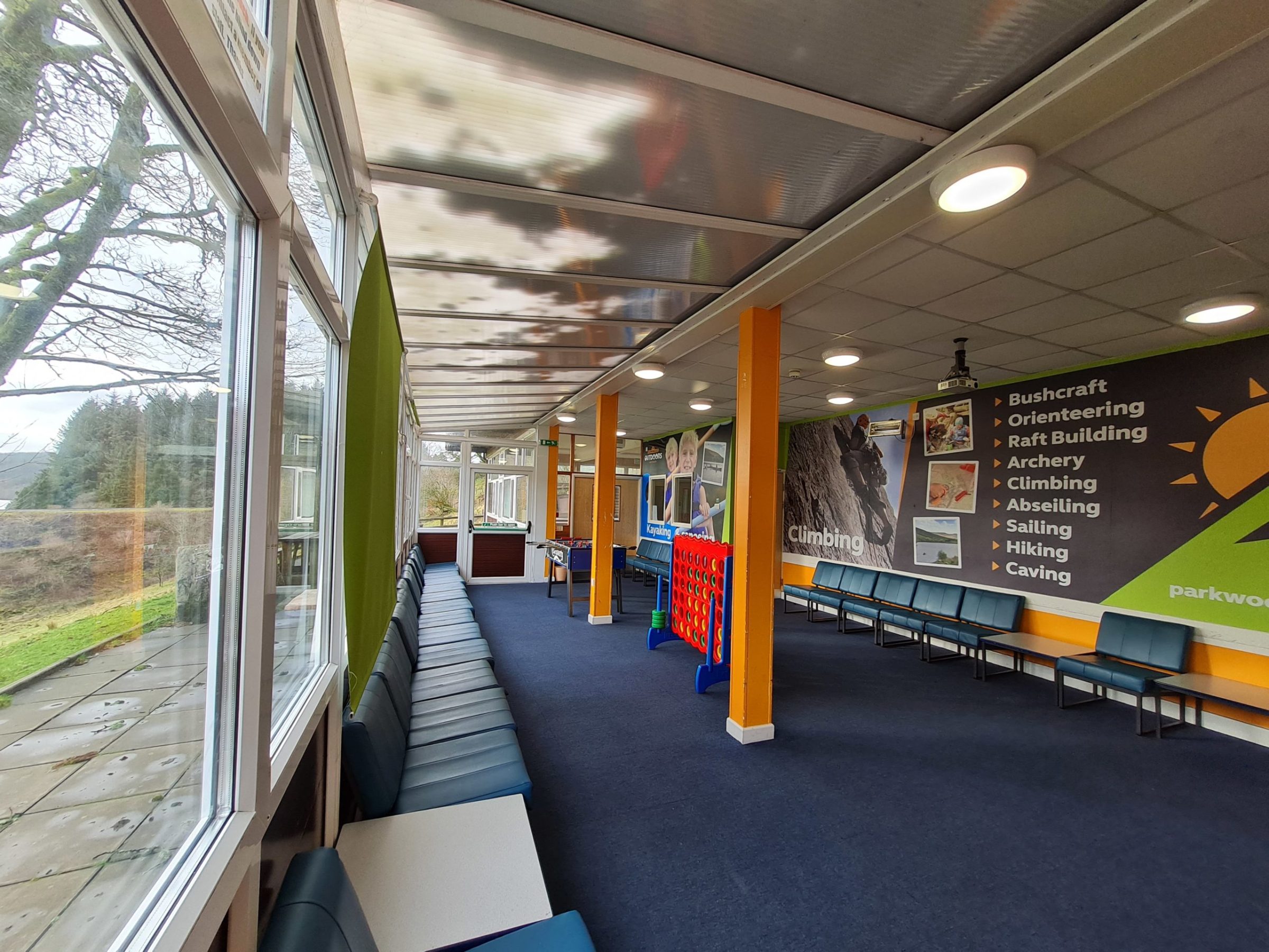 a group of people sitting at a train station