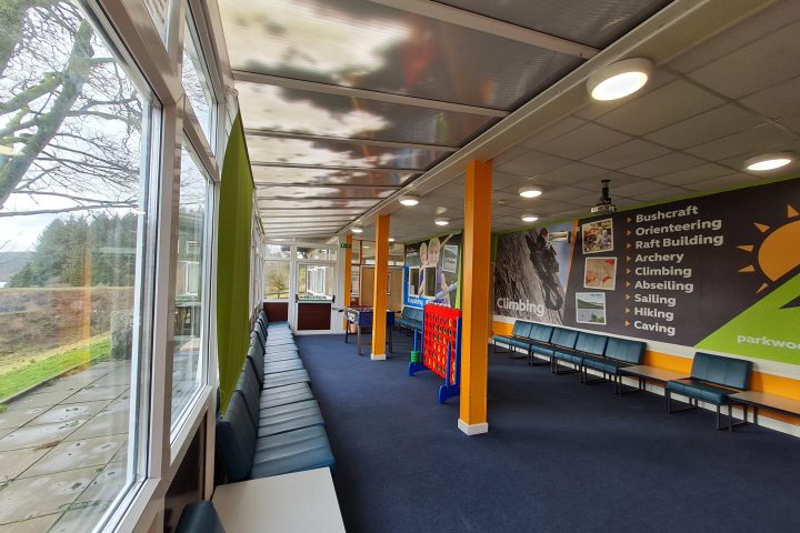 a group of people sitting at a train station