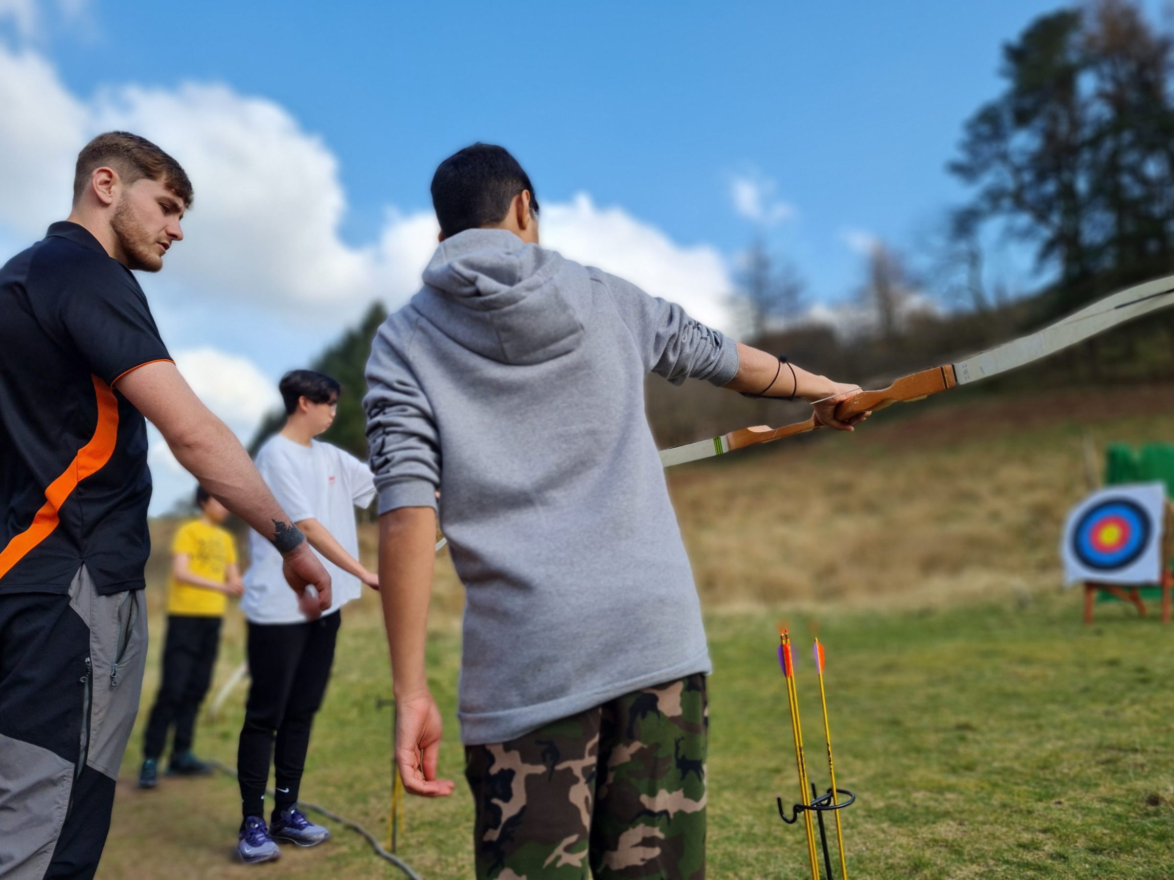 a young boy flying a kite