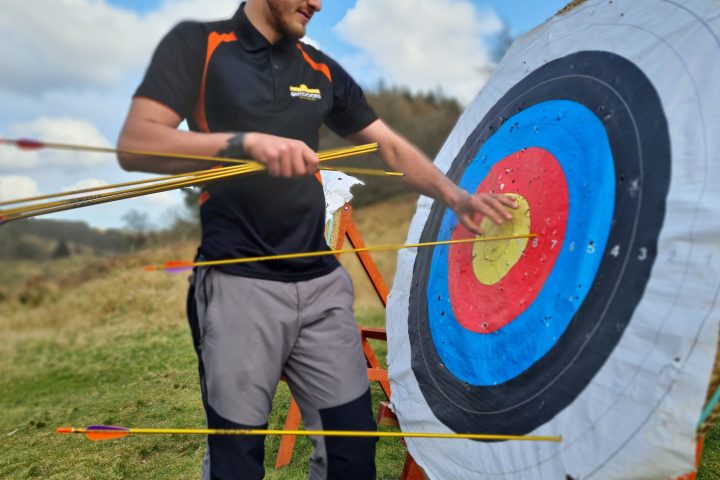 a man holding a kite