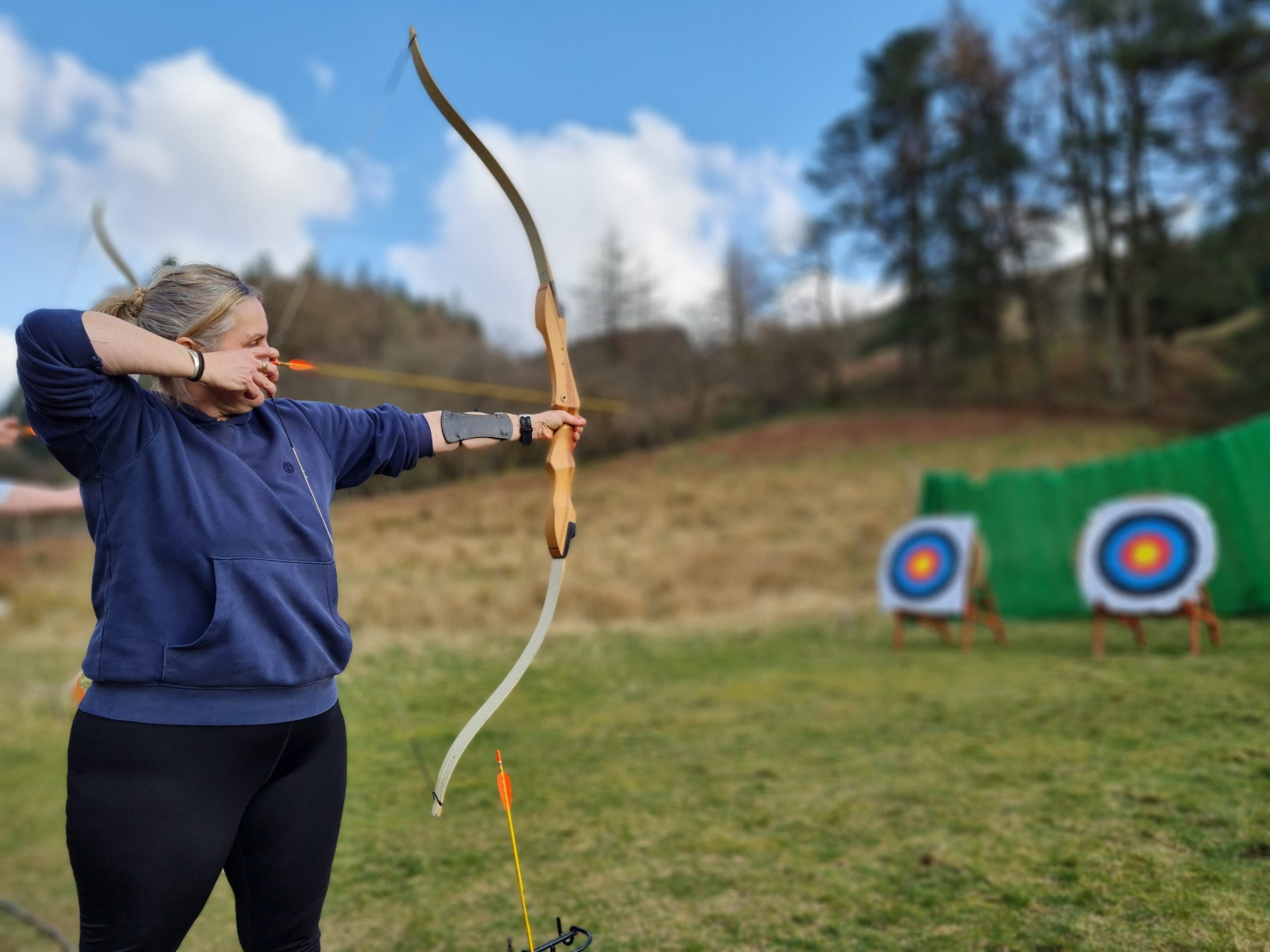 a woman holding a kite