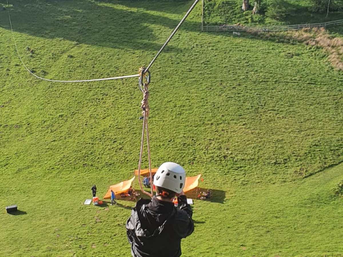 a man holding a baseball bat on a field