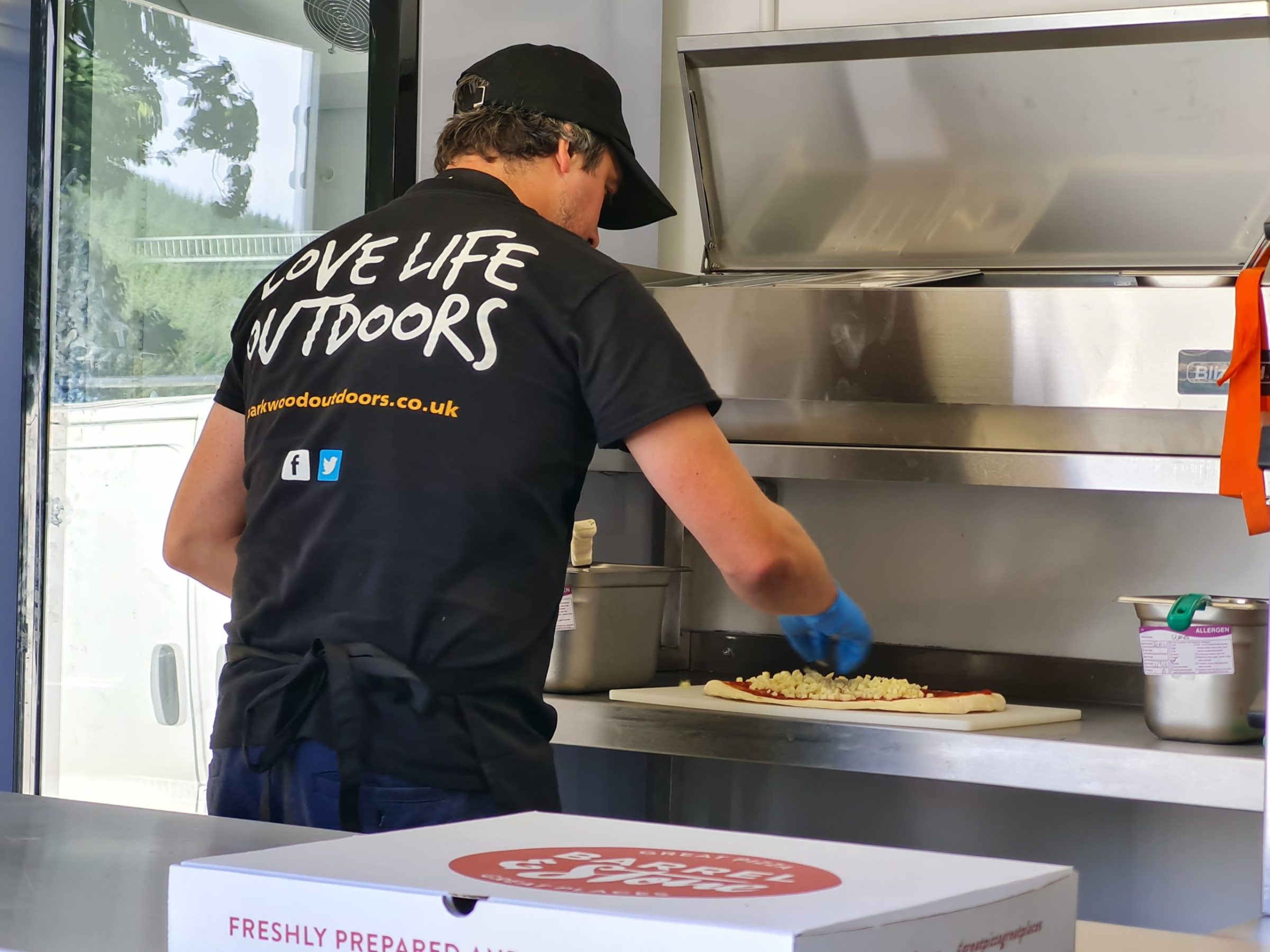 a man preparing food in a kitchen