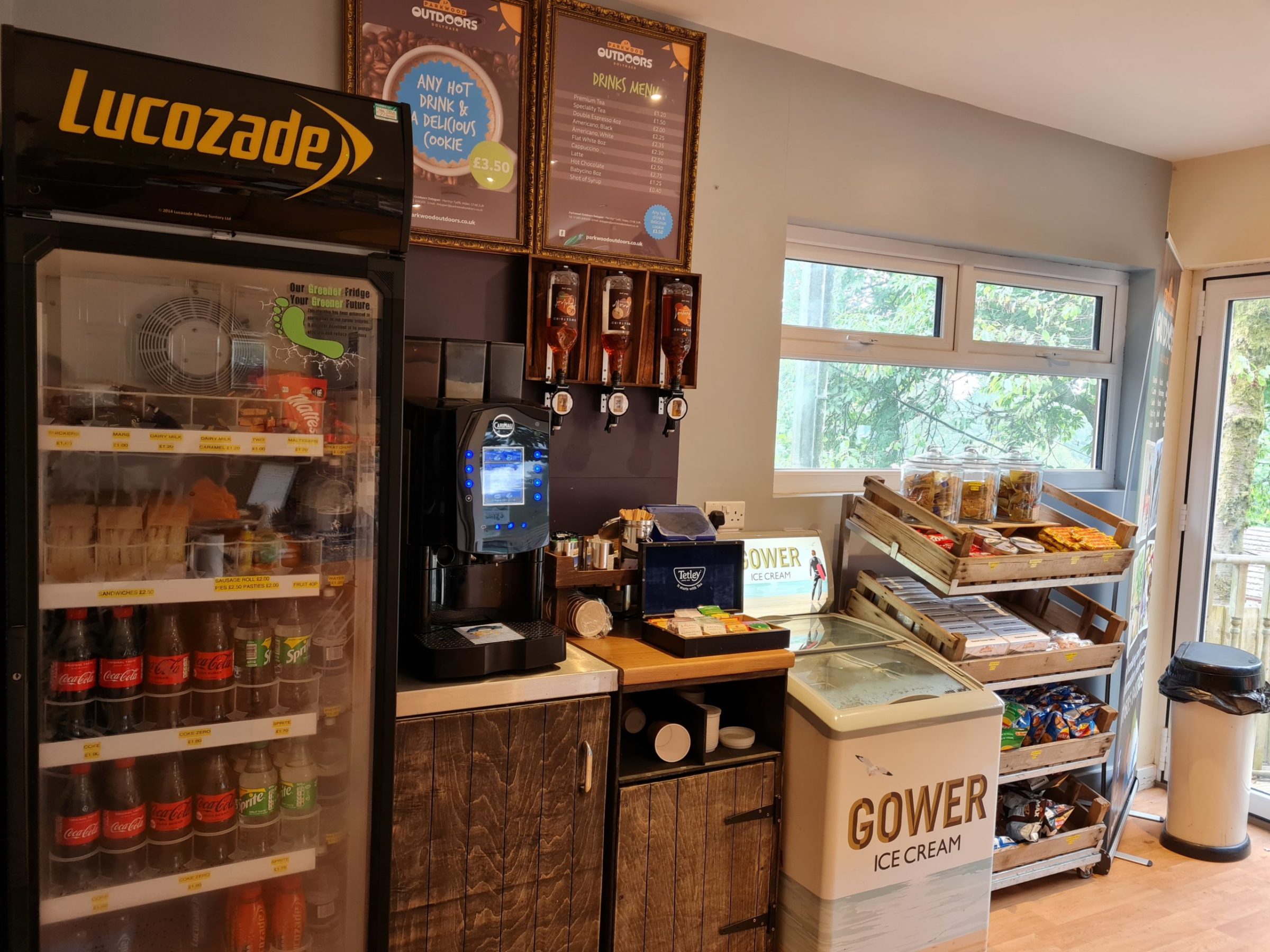 a refrigerator freezer sitting inside of a store