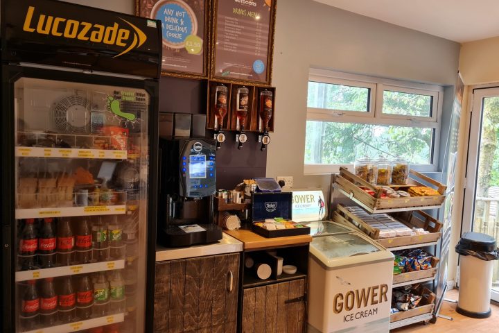 a refrigerator freezer sitting inside of a store