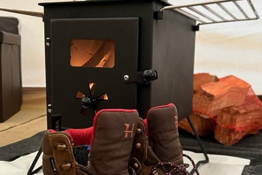 a table topped with lots of luggage