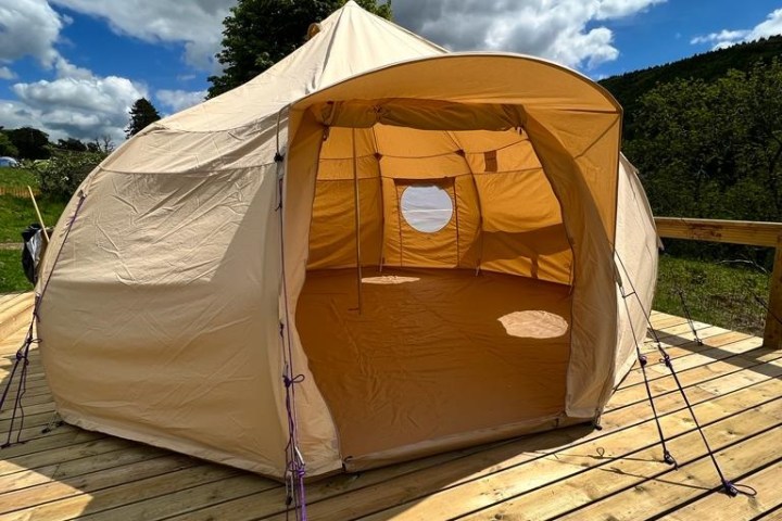 a tent in a field