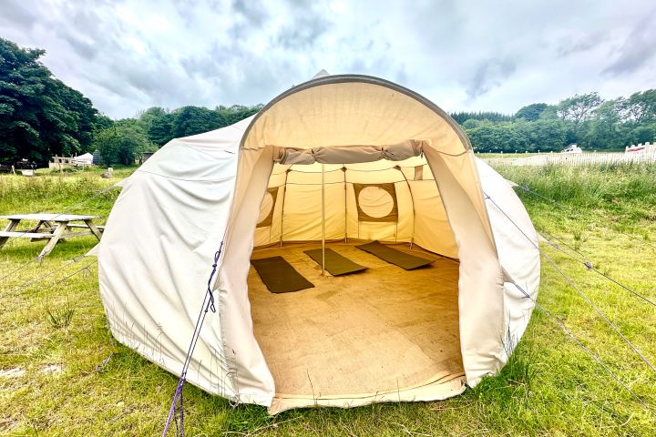 a tent in a field